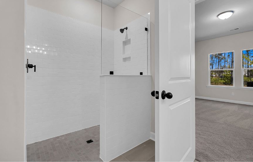 Ashton Woods 55+ Palmetto spec home plan lot 3 Primary bathroom zero entry shower