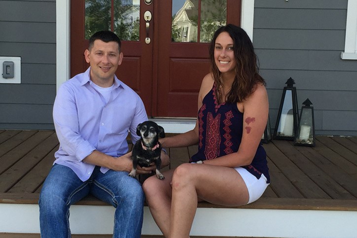 couple-sitting-on-porch-with-dog.png