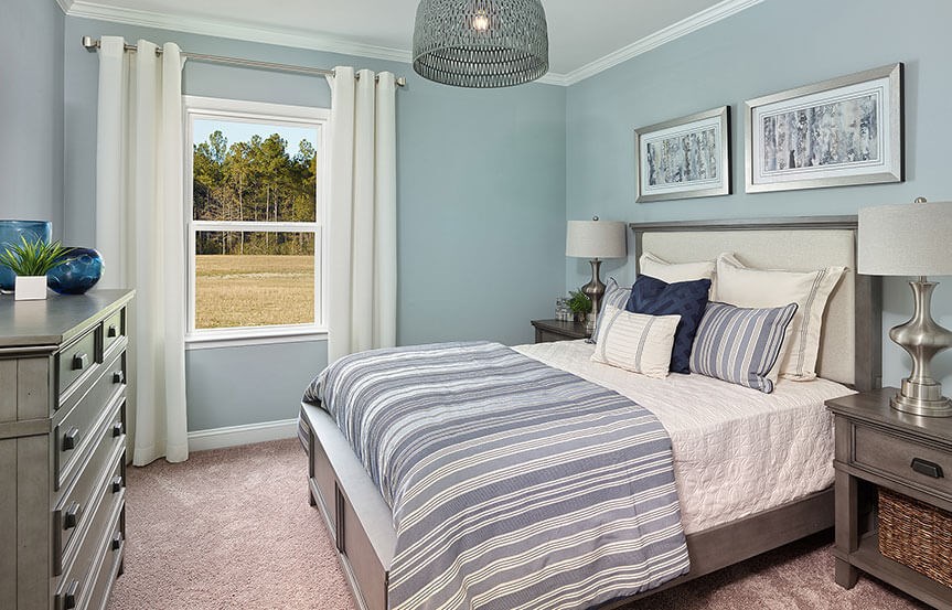 Secondary bedroom of Mitchell model home by Centex in Nexton.