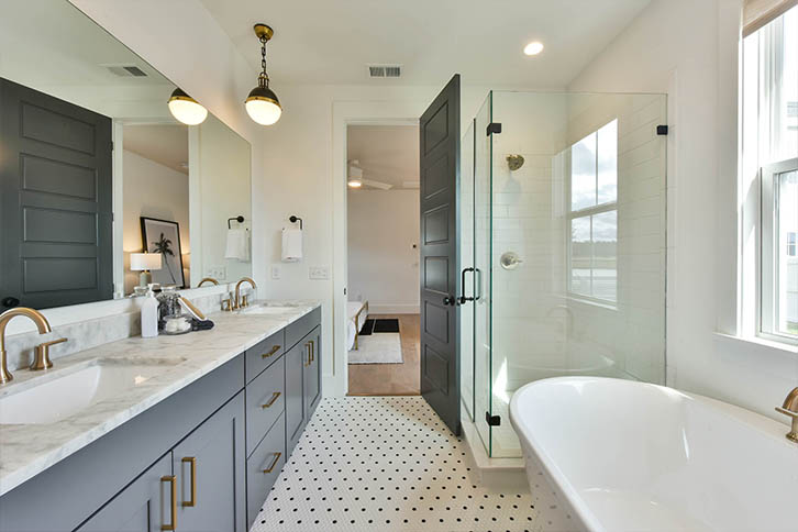 Primary bathroom suite in Nexton model home.