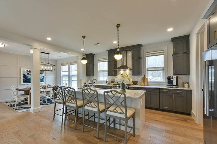 open concept living and kitchen space in model home