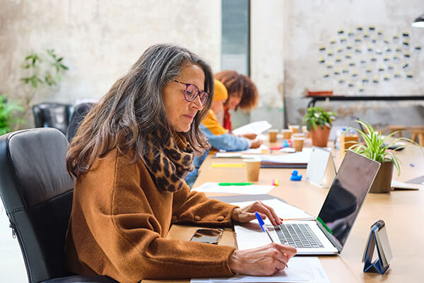 Women working in shared desk space, Nexton co-working spaces.