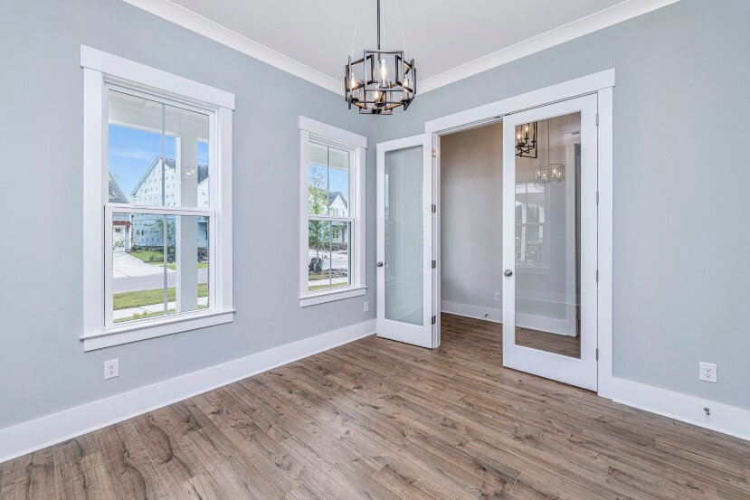 Homes By Dickerson Mansfield home plan dining room with French doors