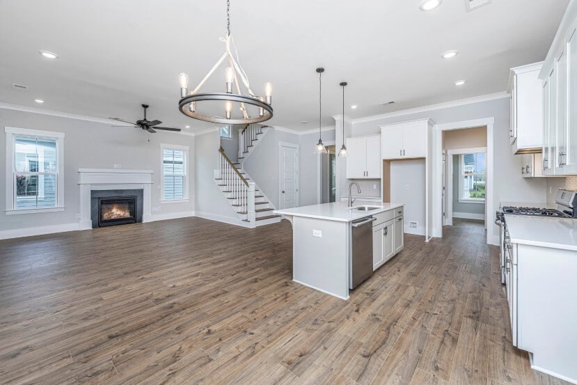 Homes By Dickerson Mansfield home plan kitchen into living room