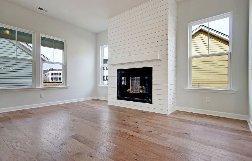 Ashton Woods Azalea home plan living room with fireplace
