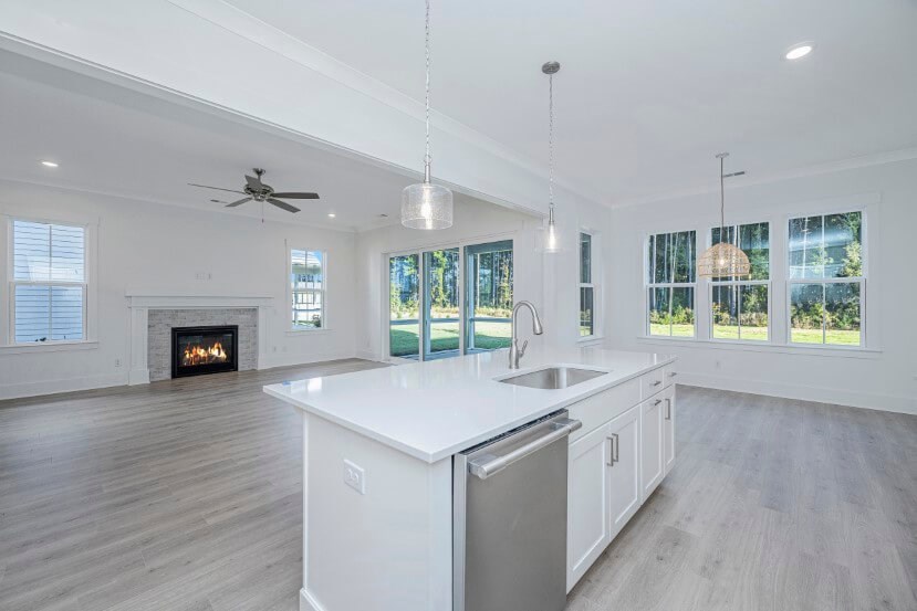 Homes By Dickerson Hampton home plan kitchen into living room