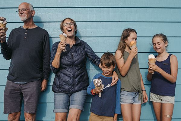 Family enjoying ice cream cones.