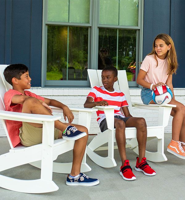 Kids relaxing on front porch