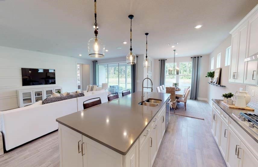 Del Webb Stellar home plan kitchen into living room