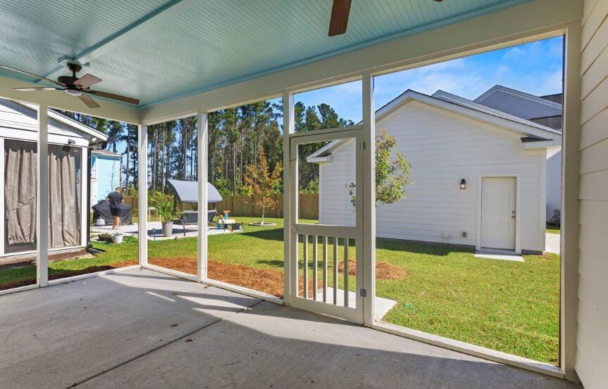 David Weekley Jenkins spec home plan lot 751 screened porch looking into backyard