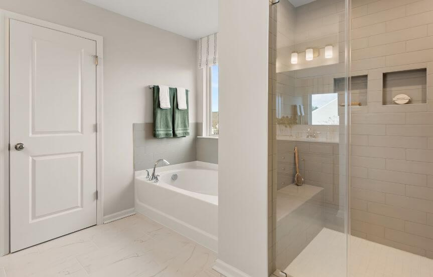 True Homes Montcrest model home plan Owner's suite tub and shower