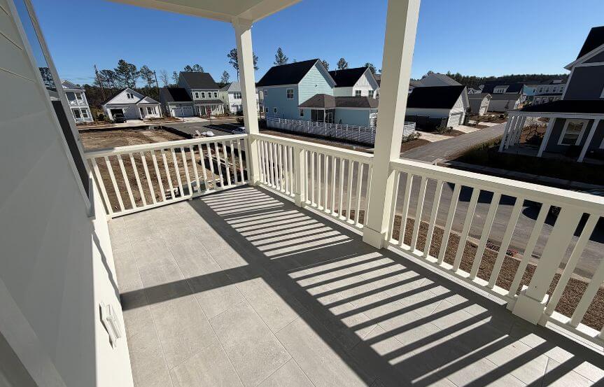 New Leaf Wake Spec Lot 1486 Primary Bedroom Tiled Porch